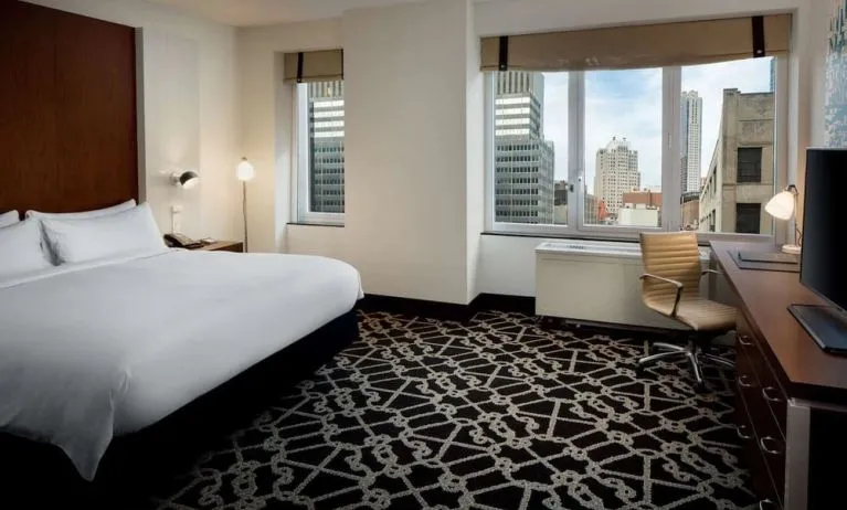 Bright and spacious day use room with work desk and city view at Hilton Brooklyn New York.