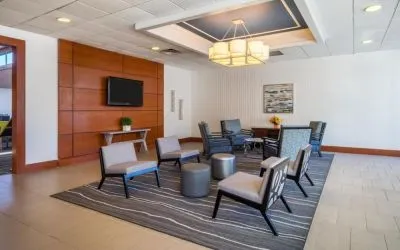 Lobby lounge at EnVision Hotel And Conference Center Mansfield Foxboro.