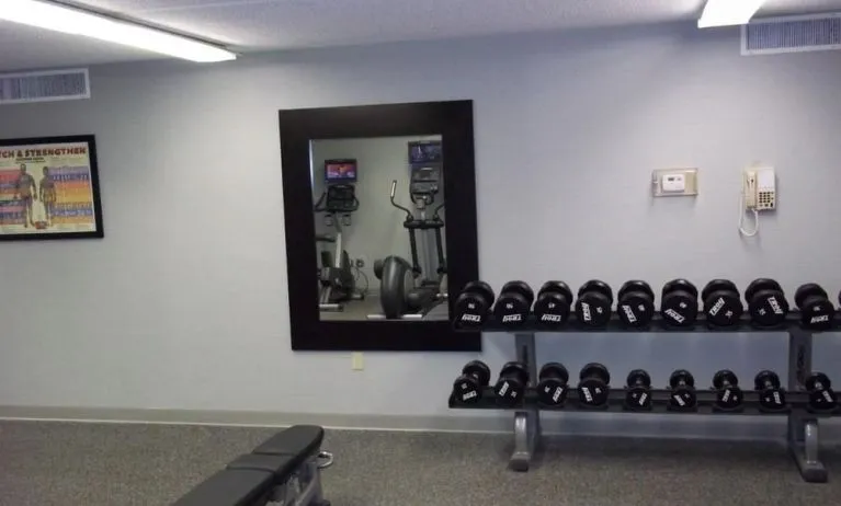 Fitness center at EnVision Hotel And Conference Center Mansfield Foxboro.
