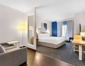 Bright and spacious day use room with lounge area at Spark By Hilton Pearland.