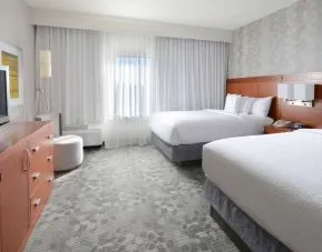 Bright and spacious day use twin room at Sonesta Select Dallas Central Expressway.
