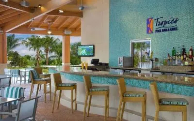 Beautiful and relaxing outdoor bar and restaurant by the pool at Hilton Orlando.