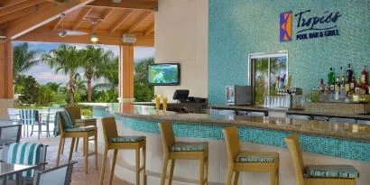 Beautiful and relaxing outdoor bar and restaurant by the pool at Hilton Orlando.