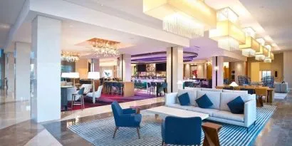 Lobby and coworking lounge at Hilton Orlando.