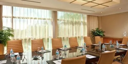 Professional meeting room with natural light at Hilton Orlando.