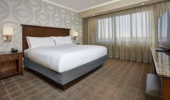 Comfortable king size bed at Embassy Suites By Hilton San Diego-La Jolla.