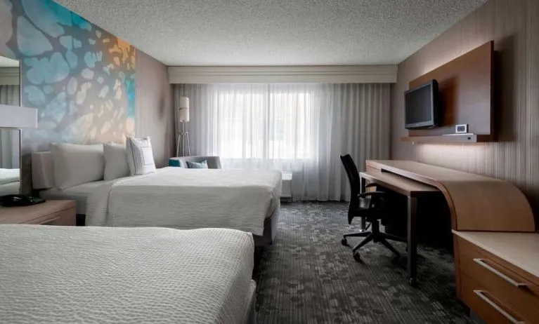 Bright and spacious day use twin room with work desk at Sonesta Select Tempe Downtown.