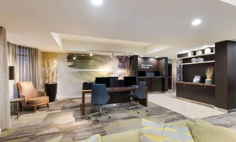 Business center with computers and printers at Sonesta Select Tempe Downtown.