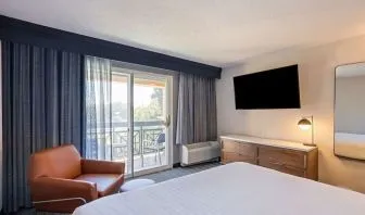 Bright and spacious day use room with balcony and work desk at Sonesta Select Pleasant Hill.