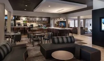 Dining area with comfortable seating, perfect for coworking at Sonesta Select Phoenix Camelback.