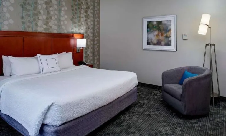 King bed at Sonesta Select Kansas City Airport Tiffany Springs.