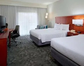 Bright and spacious day use twin room with work desk at Sonesta Select Kansas City Airport Tiffany Springs.