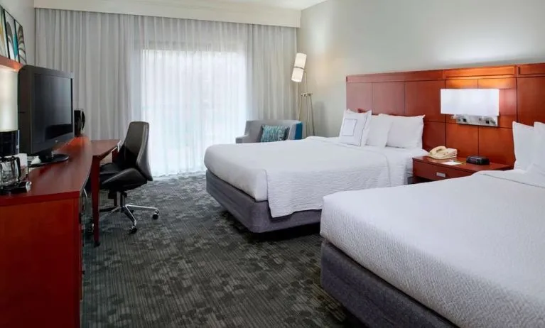 Bright and spacious day use twin room with work desk at Sonesta Select Kansas City Airport Tiffany Springs.