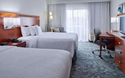 Bright and spacious day use twin room with work desk and floor to ceiling window at Sonesta Select Indianapolis Carmel.