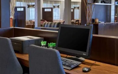 Business center with computer, printer and ergonomic chairs at Sonesta Select Indianapolis Carmel.