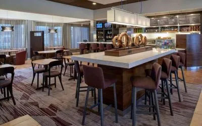 Dining area perfect for coworking at Sonesta Select Indianapolis Carmel.