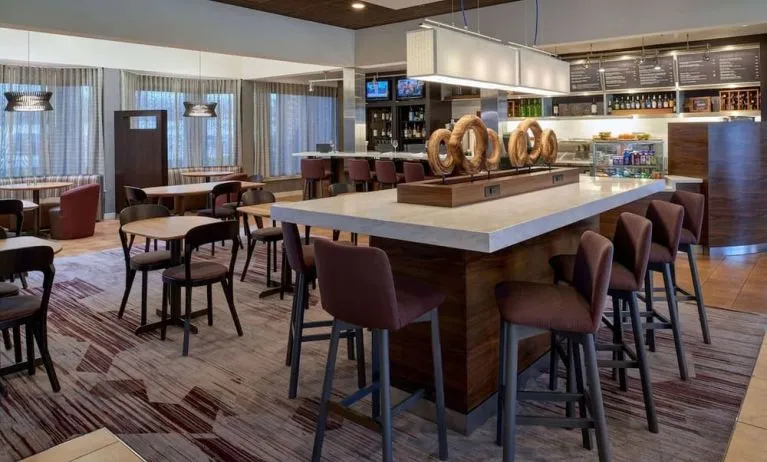 Dining area perfect for coworking at Sonesta Select Indianapolis Carmel.