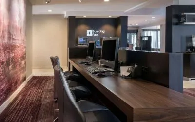 Business center with computers, printer and ergonomic chairs at Sonesta Select Los Angeles LAX El Segundo.