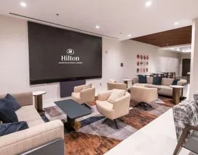 Lobby and coworking lounge at Hilton Crystal City At Washington Reagan National Airport.