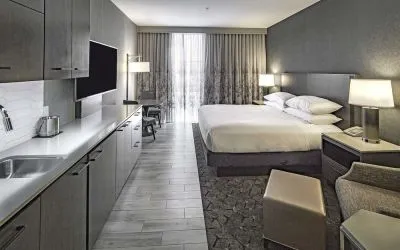 Day use room with mini kitchen and TV at DoubleTree By Hilton Modesto.