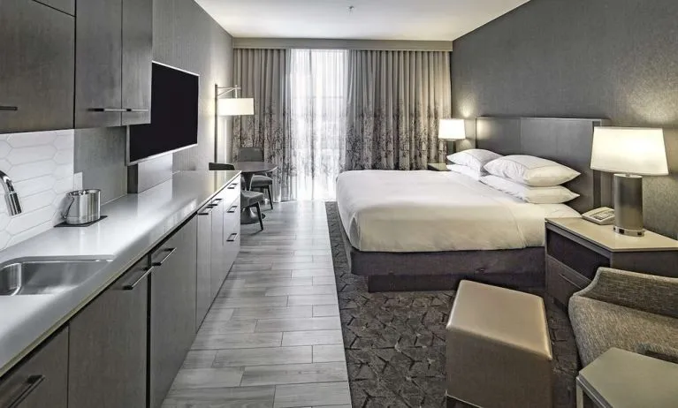 Day use room with mini kitchen and TV at DoubleTree By Hilton Modesto.