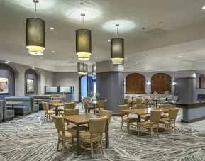 Dining area perfect for coworking at DoubleTree By Hilton Modesto.