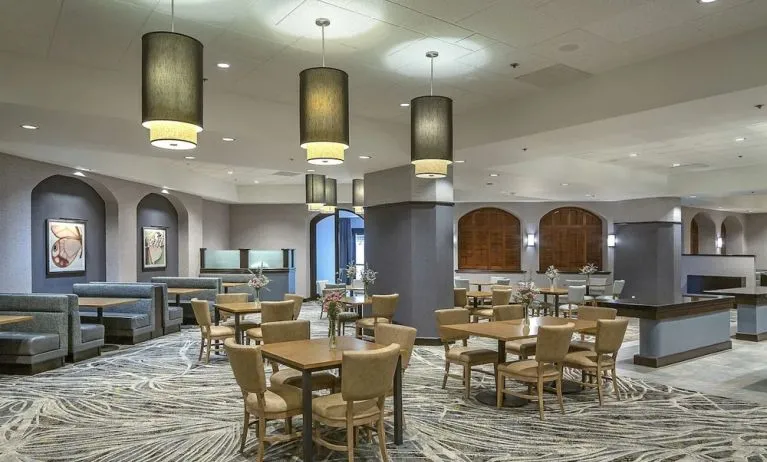Dining area perfect for coworking at DoubleTree By Hilton Modesto.