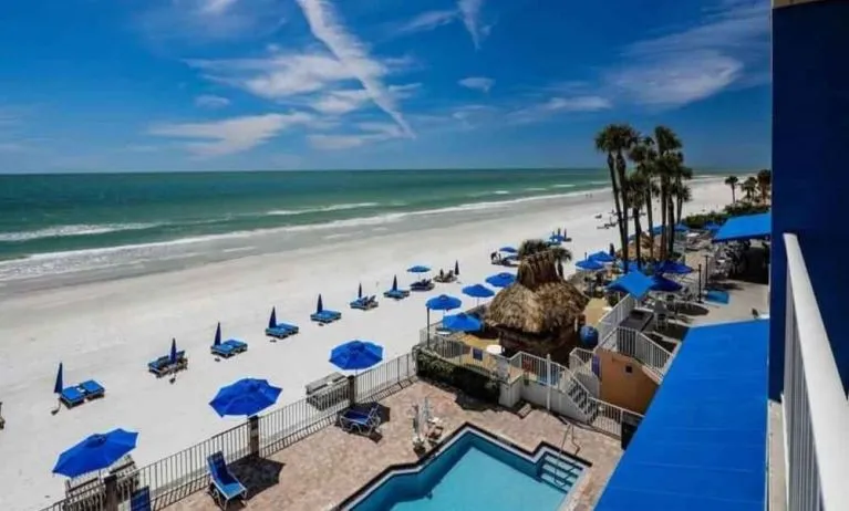 Beautiful outdoor space with pool beside the beach at DoubleTree Beach Resort By Hilton Tampa Bay - North Redington.