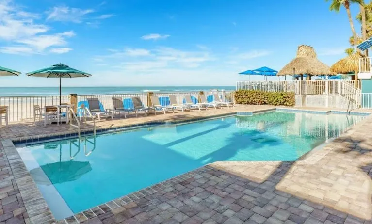 Outdoor pool overlooking the beach at DoubleTree Beach Resort By Hilton Tampa Bay - North Redington.