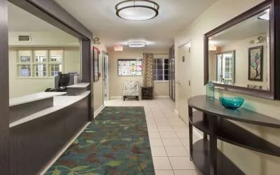 Hotel reception at Sonesta Simply Suites Dallas Las Colinas.