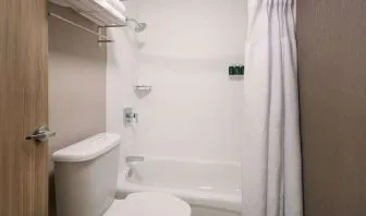 Private guest bathroom with shower at Sonesta Select Seattle Renton.