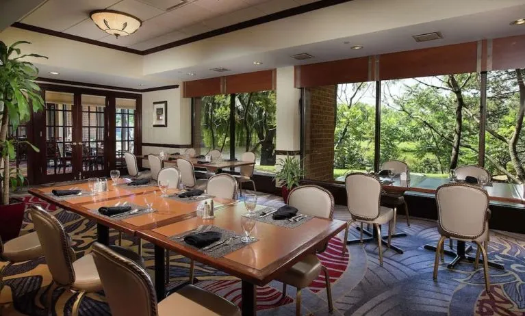Dining area with a beautiful view perfect for coworking at DoubleTree By Hilton Lisle-Naperville.