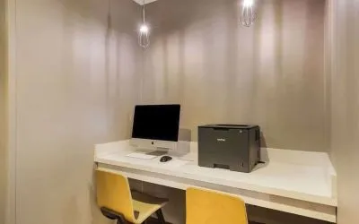 Business center with computer, printer and ergonomic chair at Sonesta ES Suites Parsippany Morris Plains.
