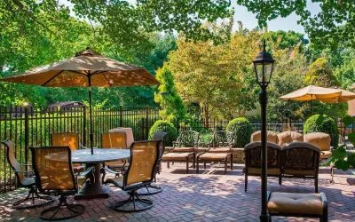 Beautiful hotel terrace with seating area at Sonesta Select Tinton Falls Eatontown.