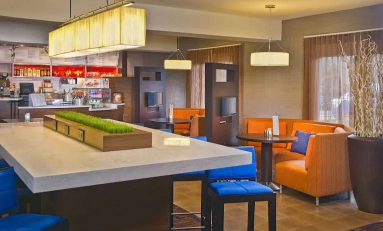 Lobby workspace at Sonesta Select Tinton Falls Eatontown.