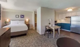 Suite with workspace and in-room kitchen at Sonesta ES Suites Austin The Domain Area.