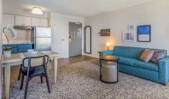 Day use suite with living room and kitchen at Sonesta ES Suites Austin The Domain Area.