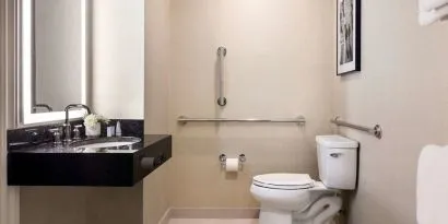 Private guest bathroom with shower at The Shelburne Sonesta New York.