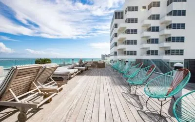 Terrace with lounge seating at Nautilus Sonesta Miami Beach.