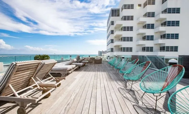 Terrace with lounge seating at Nautilus Sonesta Miami Beach.