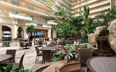 Breakfast area with natural light perfect for coworking at Embassy Suites By Hilton San Francisco Airport Waterfront.