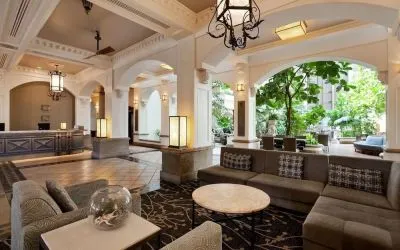 Lobby and coworking lounge at Embassy Suites By Hilton San Francisco Airport Waterfront.