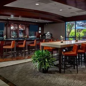 Hotel bar and lounge area at Sonesta Atlanta Airport North.