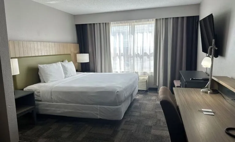 Bright and spacious day use room with work desk and private bathroom at Country Inn & Suites By Radisson, Chicago O'Hare South.