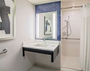 Private guest bathroom with shower at Royal Sonesta Boston.