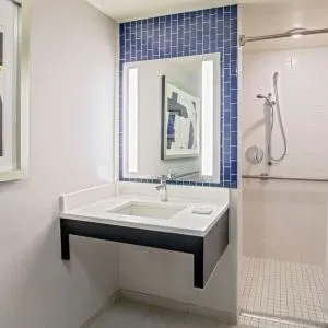Private guest bathroom with shower at Royal Sonesta Boston.