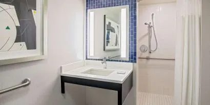 Private guest bathroom with shower at Royal Sonesta Boston.