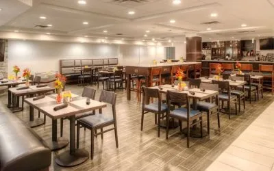 Dining area and workspace, perfect for coworking at Holiday Inn Belcamp - Aberdeen Area.