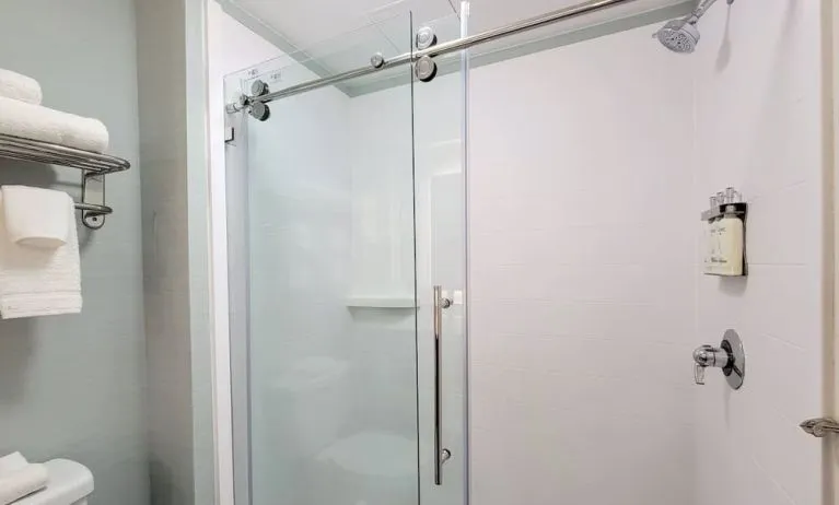 Private guest bathroom with shower and free toiletries at Holiday Inn Belcamp - Aberdeen Area.