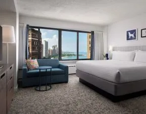 Bright and spacious day use room with sofa and private bathroom at Sonesta ES Suites Chicago Downtown Magnificent Mile - Medical.